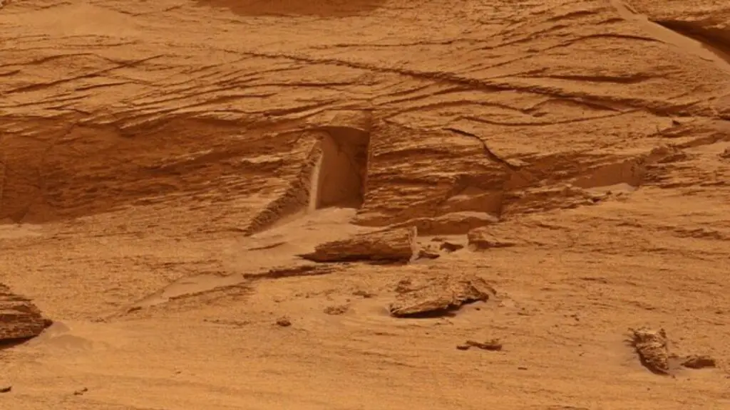 A photograph taken by a NASA rover shows a door like opening on Mars