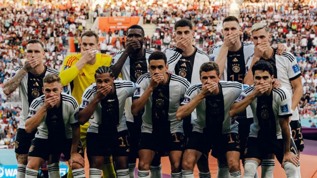 German players  protest FIFA by covering their mouths during the World Cup
