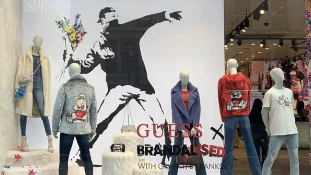 Guess uses Banksy's artwork without permission, Banksy request customers to steal their clothes