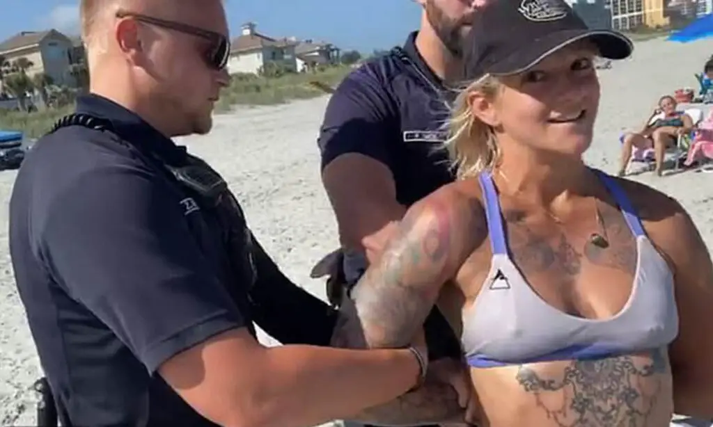 sam-detained-by-for-wearing-revealing-bikini